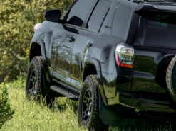 Cali Raised LED 10-21 Toyota 4Runner Step Edition Bolt On Rock Sliders Kick Out Powder Coat Raw - 39302154715178